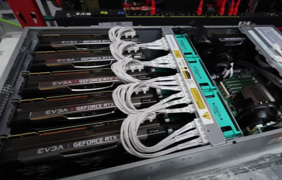 GPU mining rig with multiple graphics cards and power cables