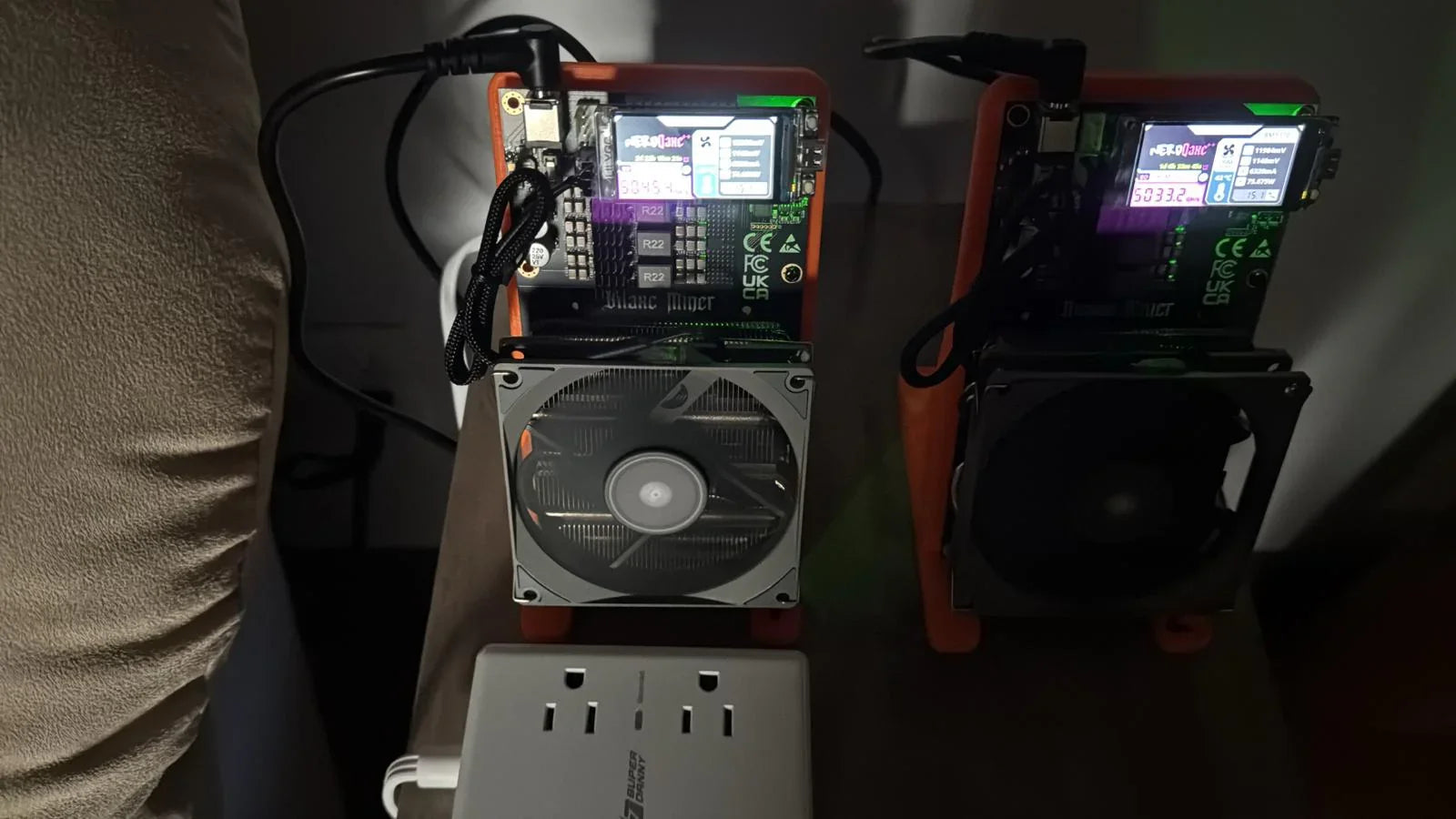 Two small mining devices with display screens